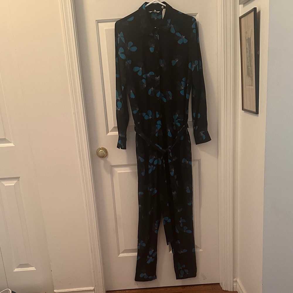 Chic Black Jumpsuit with Blue Floral Design